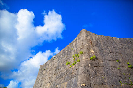 Smooth curve rampart of Shuri Castle and blue skyのeditorial素材