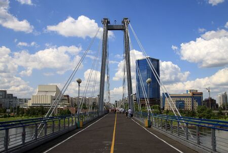 KRASNOYARSK, RUSSIA - JULY 16, 2013:  Pedestrian bridge over the Yenisei to the Tatyshev Islandのeditorial素材