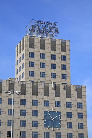 BARCELONA, CATALONIA, SPAIN - DECEMBER 13, 2011: Clock and windows of Hotel Catalonia Barcelona Plaza in Barcelonaのeditorial素材