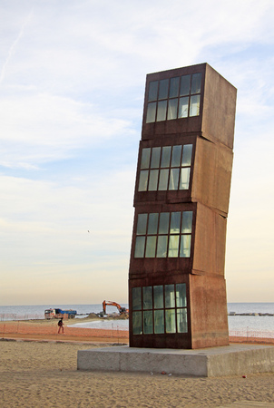 BARCELONA, CATALONIA, SPAIN - DECEMBER 13, 2011: El lucero herido -  metallic cubic sculpture by artist Rebecca Horn at Barceloneta beachのeditorial素材