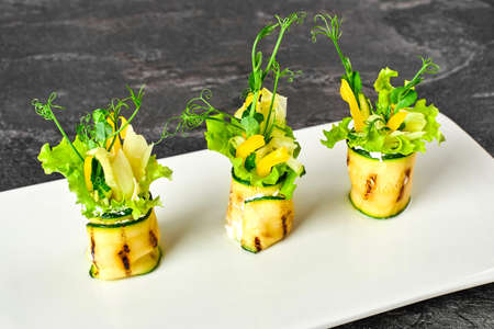 grilled vegetable canapes - pepper, salad, potatoes, white cheese, eggplant, zucchini. snacks for vegetariansの写真素材