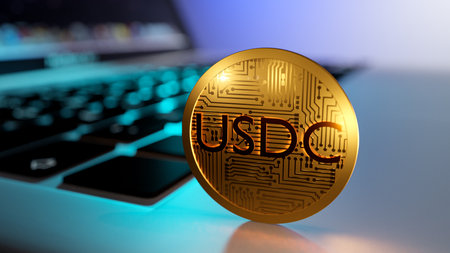 usdc cryptocurrency. gold coin on a laptop close-up. stablecoin 3d renderingの写真素材