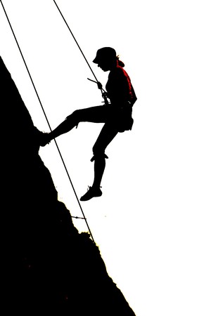 downhill of free style climber after conquering the peakの写真素材