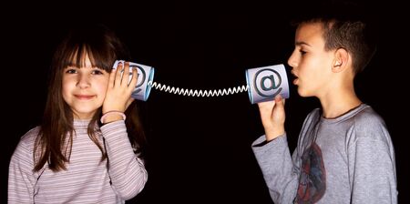 Boy and girl used the Internet communicationの写真素材