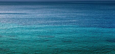 various shades of the color of sea waterの写真素材