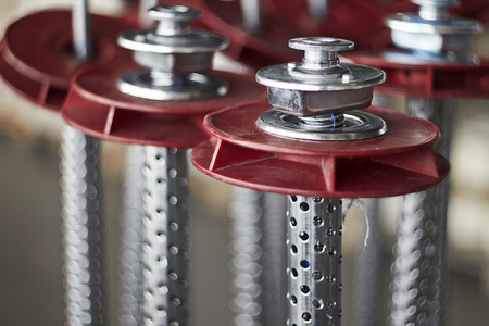 Detail of an indoor industrial production line, in a textile factory