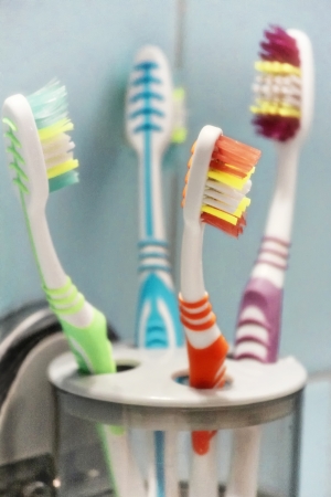 New Colorful Toothbrushes in A Glassの写真素材