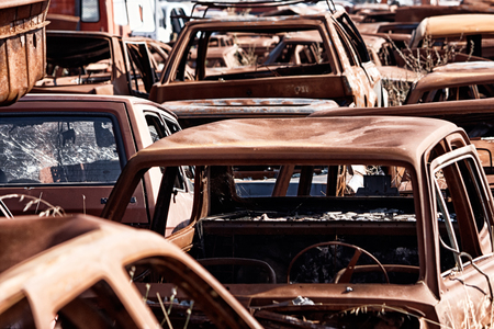 A lot of used cars in the junkyard の写真素材