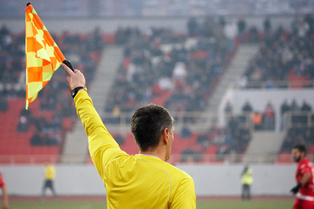 Assistant football referee, soccer referee in the stadiumの写真素材