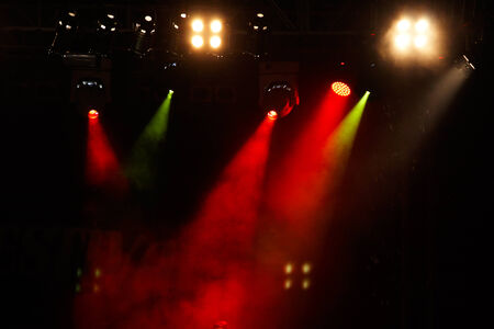 Image of colorful concert lighting on a dark backgroundの写真素材