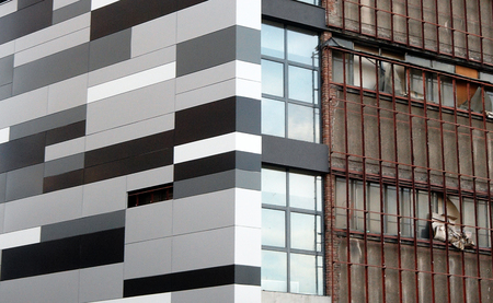 Construction of new house. Work on the facade of the new building.の写真素材