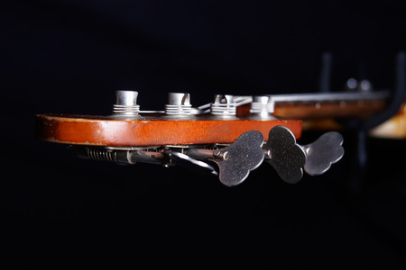 Bass guitar head, focus on  Machine Headsの写真素材