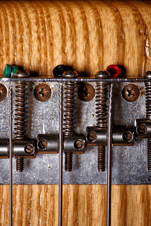 Electric bass guitar, closeup, focus on stringsの写真素材