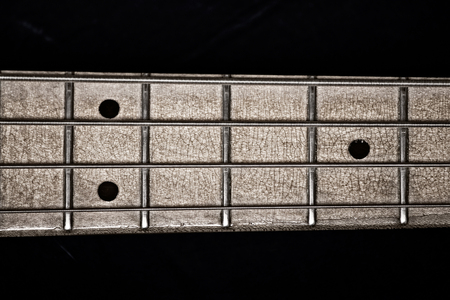 Electric bass guitar, closeup, focus on stringsの写真素材