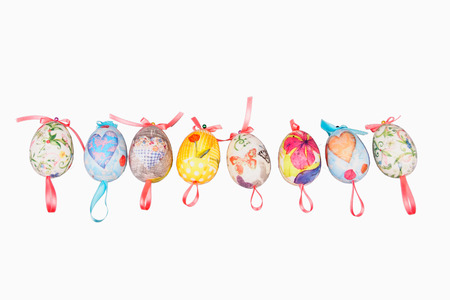 Colorful decoupage easter eggs, isolated on whiteの写真素材