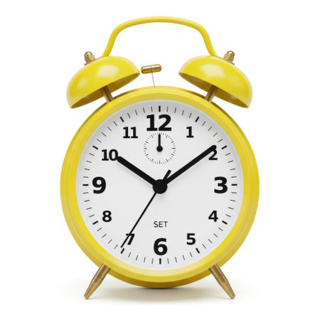 A cheerful yellow retro alarm clock with twin bells and a classic analog face. This timeless timepiece offers a loud ring to ensure you wake up on time with vintage charm.の素材