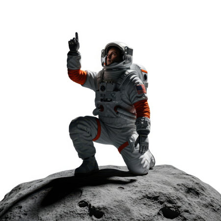 An astronaut in a white and orange spacesuit is kneeling on a rocky surface, likely representing the moon. The astronaut is pointing upwards with their right hand, suggesting a gesture of discovery or direction. The background is plain white, emphasizing the astronaut and the lunar landscape.の素材