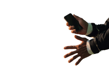 Prisoner holding a white background phone