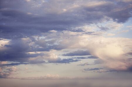 White light air clouds on a blue sky on a clear Sunny day