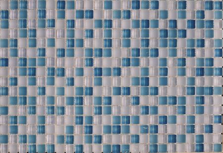 Glass ceramic multi-colored tiles of white and blue elements for the poolの写真素材