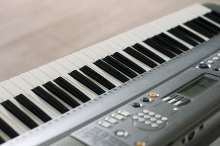 Black and white keys of a synthesizer shot close-upの写真素材