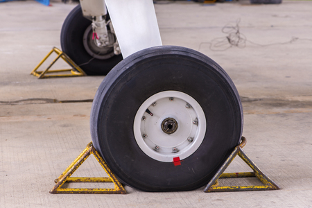 Front landing gear on the groundの写真素材