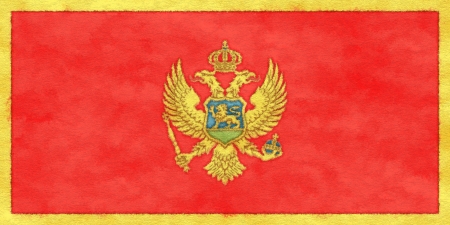 Montenegro flag on ageing paperの写真素材