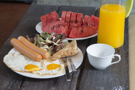 Sausages, Eggs and salad for Breakfast の写真素材