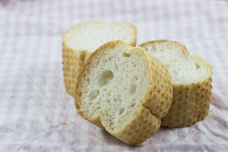 freshly baked homemade tradtional hand sliced breadの写真素材
