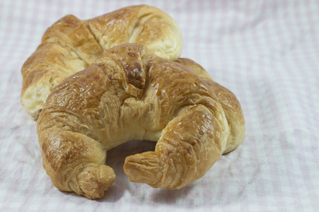 Fresh Croissants on checkered napkin.の写真素材