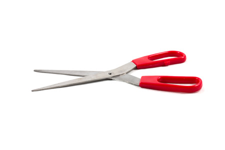 Red scissors on the white backgroundの写真素材