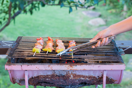 Grill barbecue on fire.の写真素材