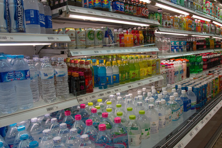 BANGKOK,THAILAND - November 01,2014:Many different drink bottles on display shelf at Isetan supermarket at Central World in Bangkok,Thailand on November 01,2014のeditorial素材