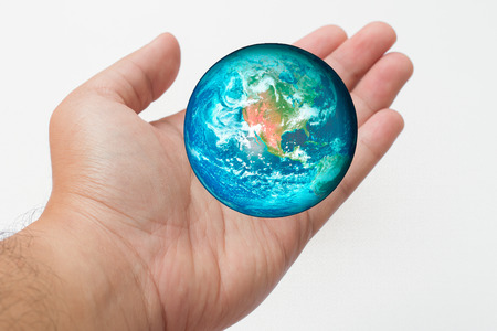 Earth in hand Elements of this image furnished by NASAの写真素材