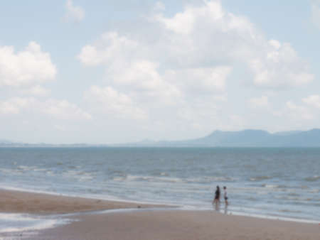 Group of people on beachblurred background.の写真素材