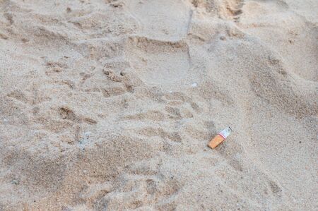 Used cigarette onbeach.の写真素材
