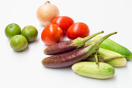 Lemontomatoonioncucumber and purple Eggplant on white background.の写真素材