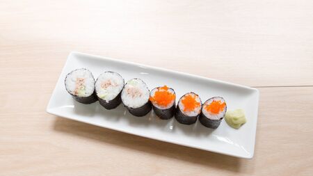 Homemade sushi on wooden table.の写真素材