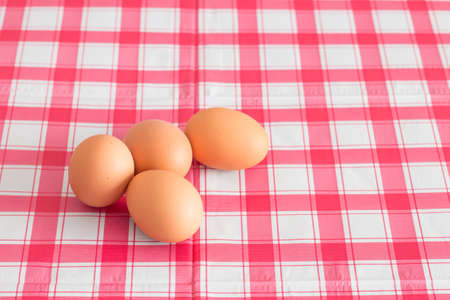 Eggs on table in a kitchen.の写真素材