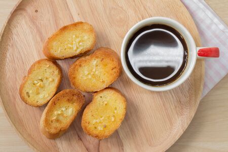 Garlic bread and a cup of coffee,From aboveの写真素材