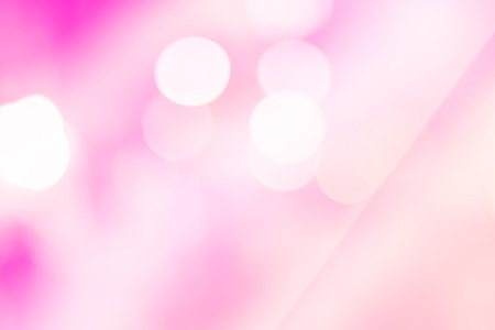 Abstract bokeh in exhibition hall with pink color filterの写真素材
