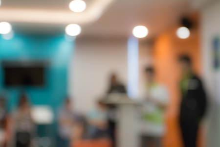 Abstract blurred people in class room with bokeh, education conceptの写真素材