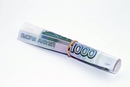 The bill thousand rubles in gold wedding ringの写真素材