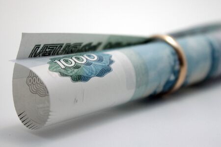 The bill thousand rubles in gold wedding ringの写真素材