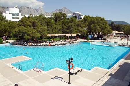 Net swimming pool on the territory of the hotel  Mountain landscape and pineのeditorial素材