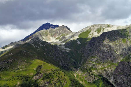 Mountain peaks in Dombai  Summer in cloudy weatherの写真素材