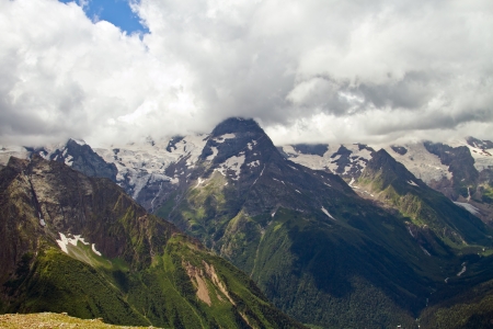 Mountain peaks in Dombai  Summer in cloudy weatherの写真素材