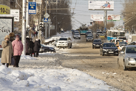 VOLGOGRAD - DECEMBER 12 City road cleared from snow  Movement is restored, but difficult    December 12, 2013 in Volgograd, Russia のeditorial素材