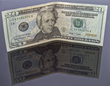 20 dollar bill and a new sample