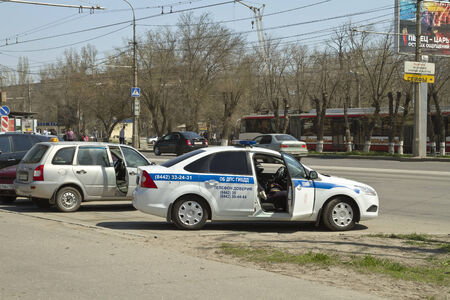  VOLGOGRAD - APRIL 21 The road patrol service of the new police car parked at the curb   April 21, 2014 in Volgograd, Russia のeditorial素材